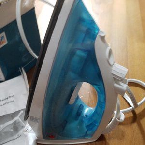 Spray  steam dry iron.
